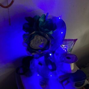 Blue roses made from home with ribbon and other materials
